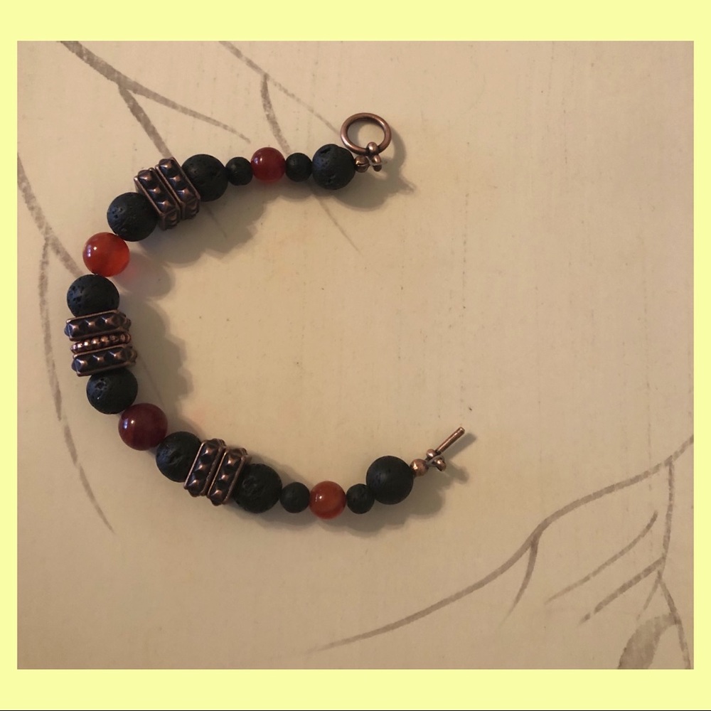 Toggle clasp bracelet designed with lava beads